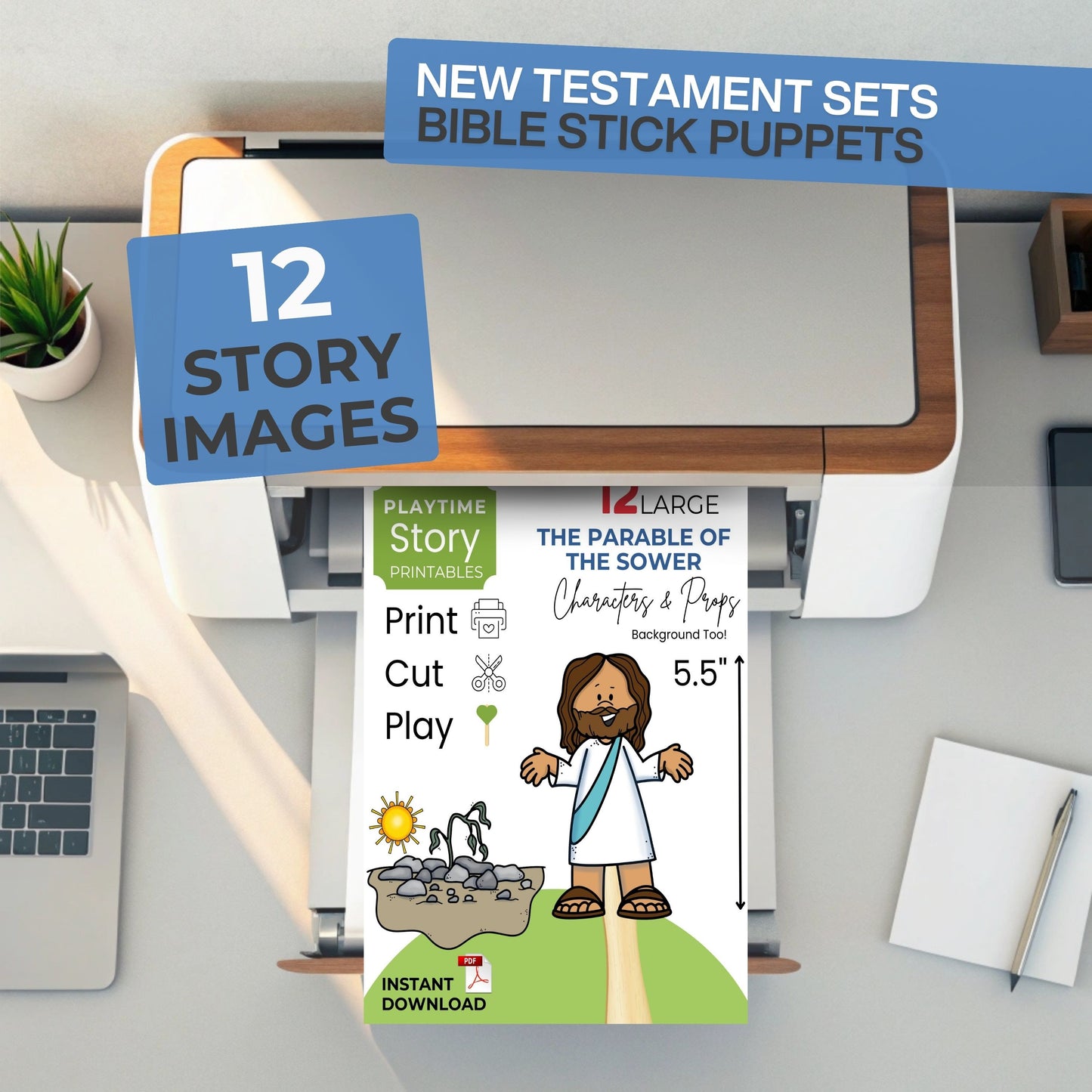 Bible stick puppets packaging with a printer and laptop on a desk