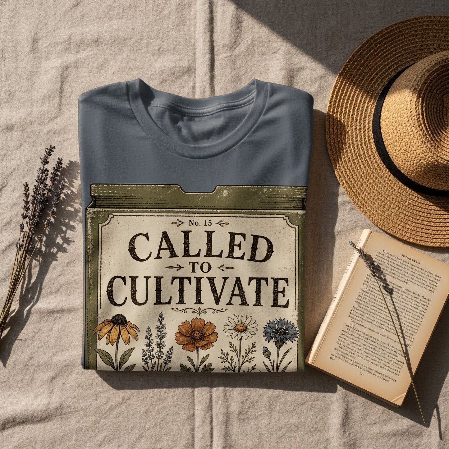 Gray t-shirt with "CALLED TO CULTIVATE" text and floral illustrations.