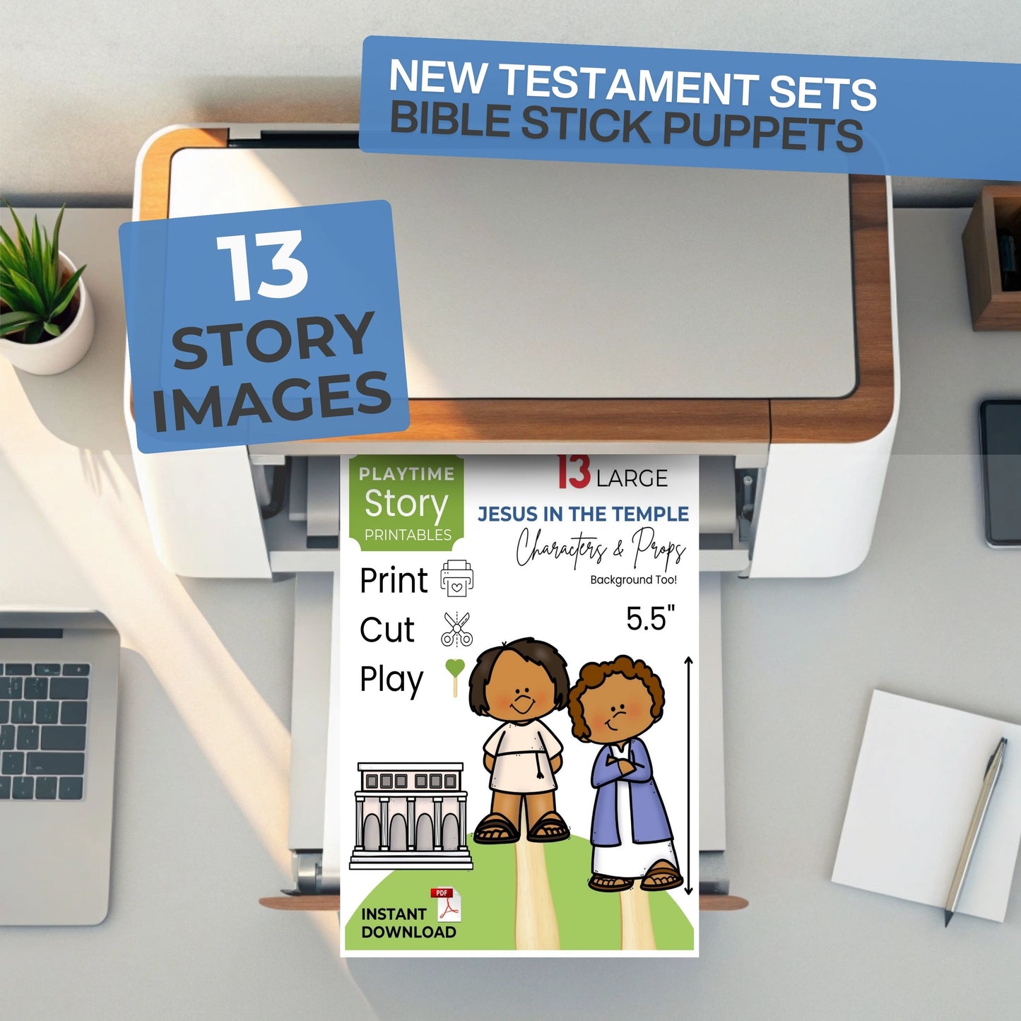 Bible stick puppets packaging with printer and laptop on a desk