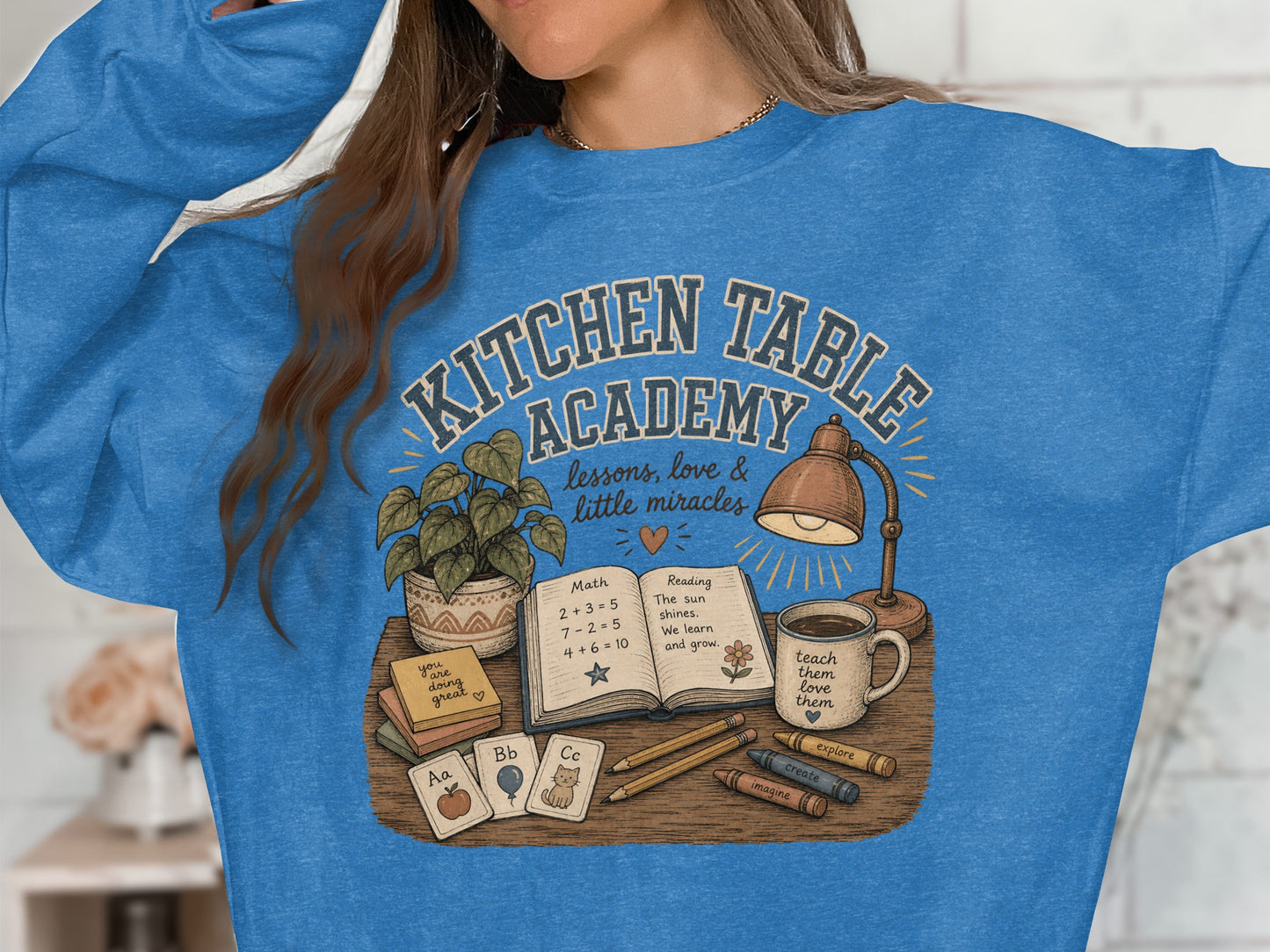 Kitchen Table Academy graphic with books, lessons, and school supplies.
