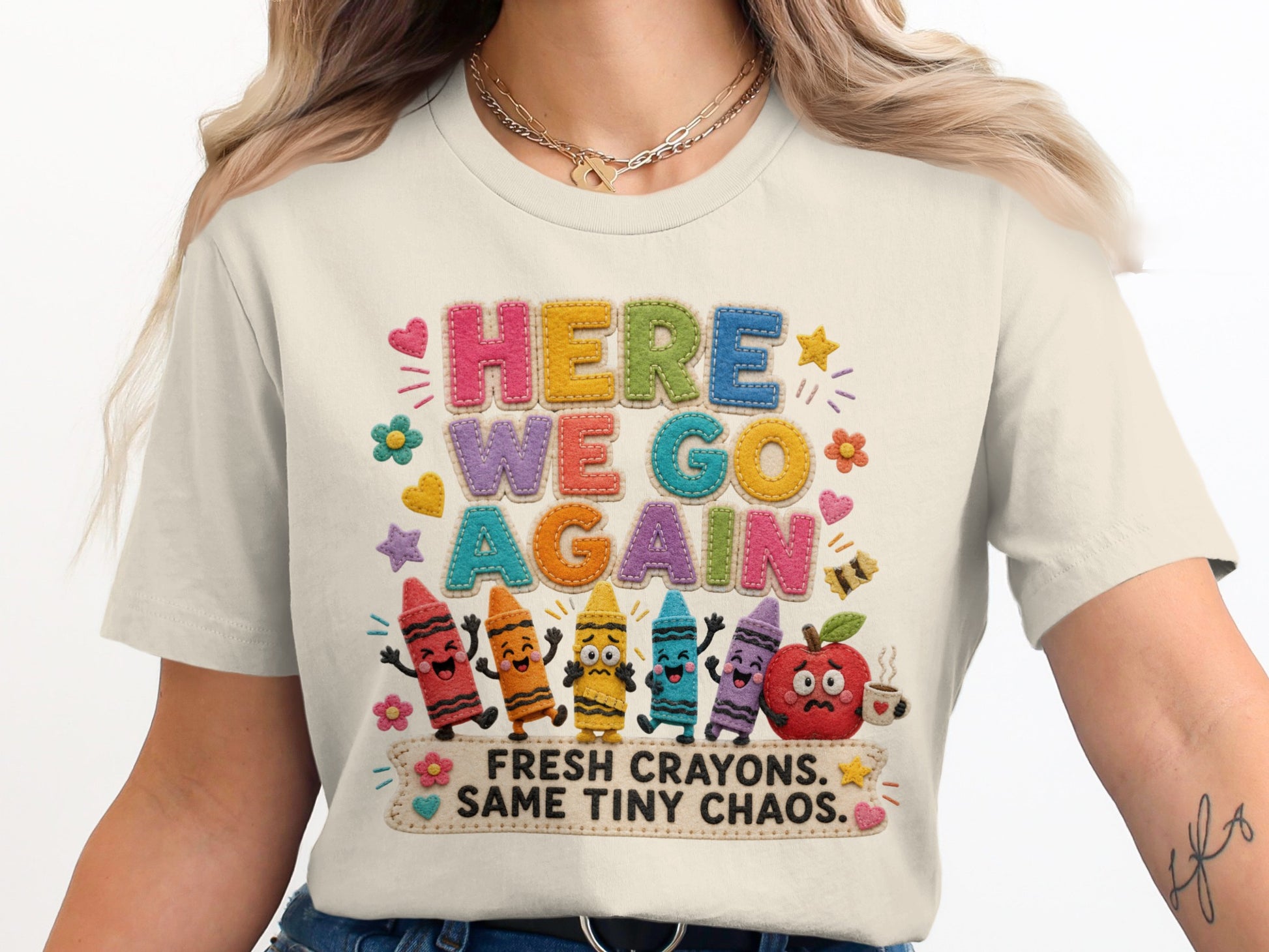 "Here We Go Again Fresh Crayons Same Tiny Chaos" shirt with cartoon crayons and apple.