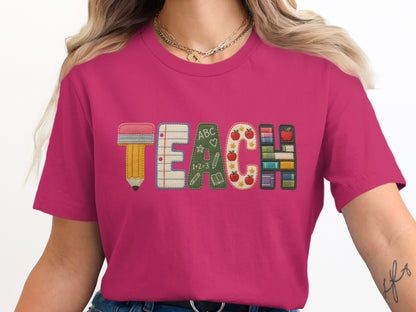 Fuchsia t-shirt with "TEACH" text made from school-themed applique letters.