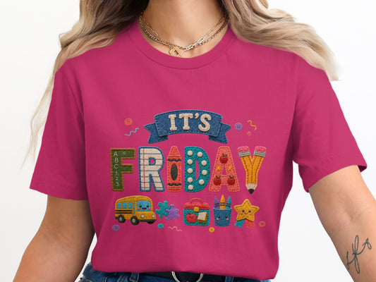 Pink t-shirt with "IT'S FRIDAY" and school-themed applique graphics.
