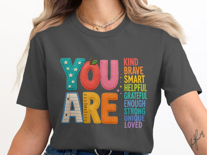 "YOU ARE KIND BRAVE SMART HELPFUL GRATEFUL ENOUGH STRONG UNIQUE LOVED" t-shirt design.