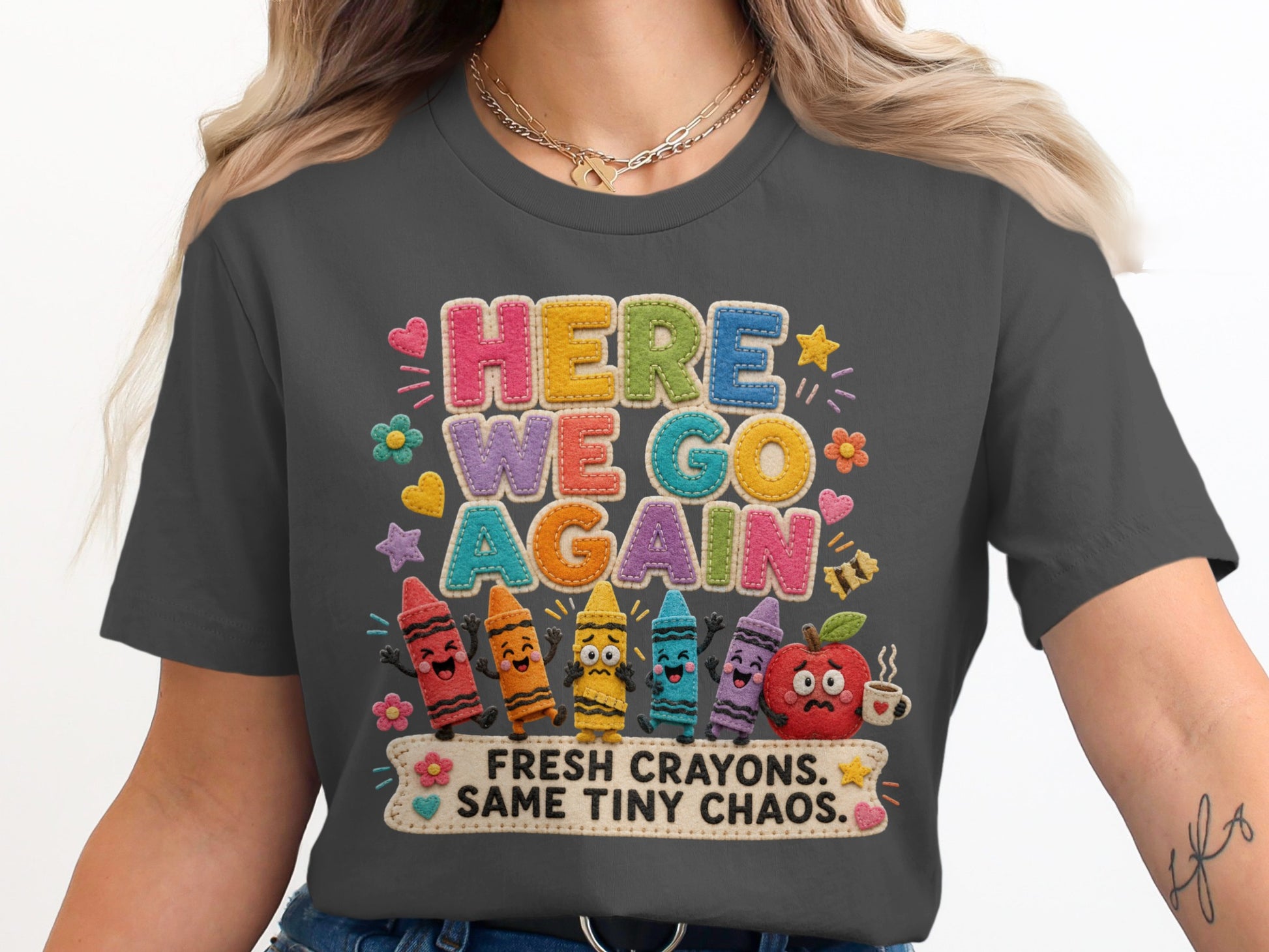 "Here We Go Again" shirt with crayons, apple, and text saying "Fresh Crayons. Same Tiny Chaos."