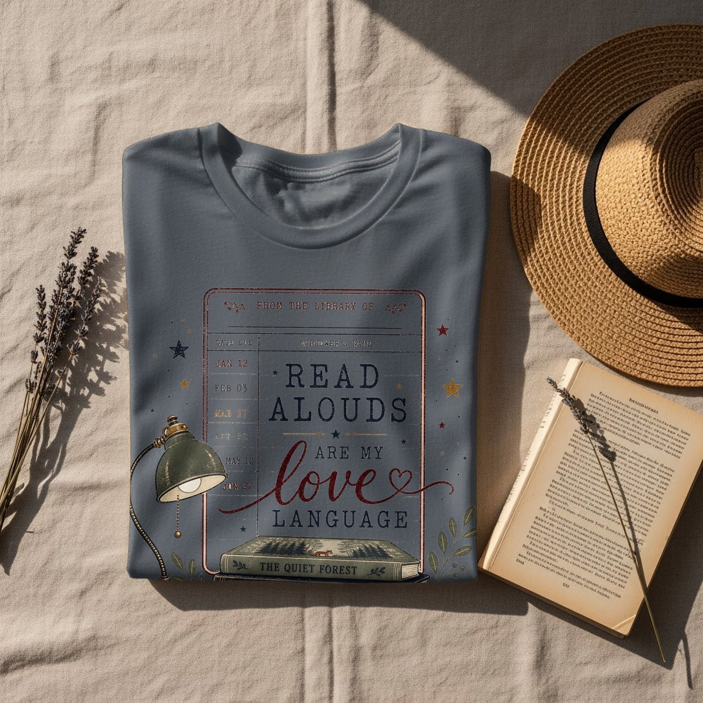 Grey t-shirt with "Read Alouds Are My Love Language" design, a book, and a lamp.