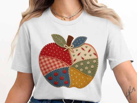 Quilted apple graphic with various patterns and small apples, pencils, and flowers.