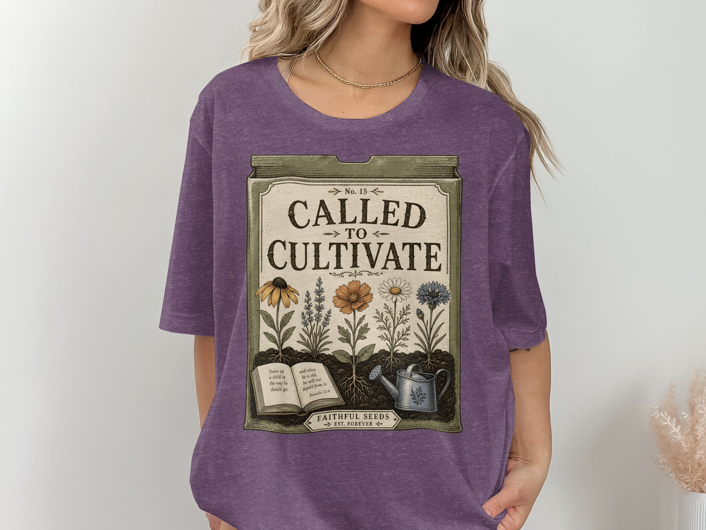 T-shirt with "Called to Cultivate" design featuring flowers, book, and watering can.
