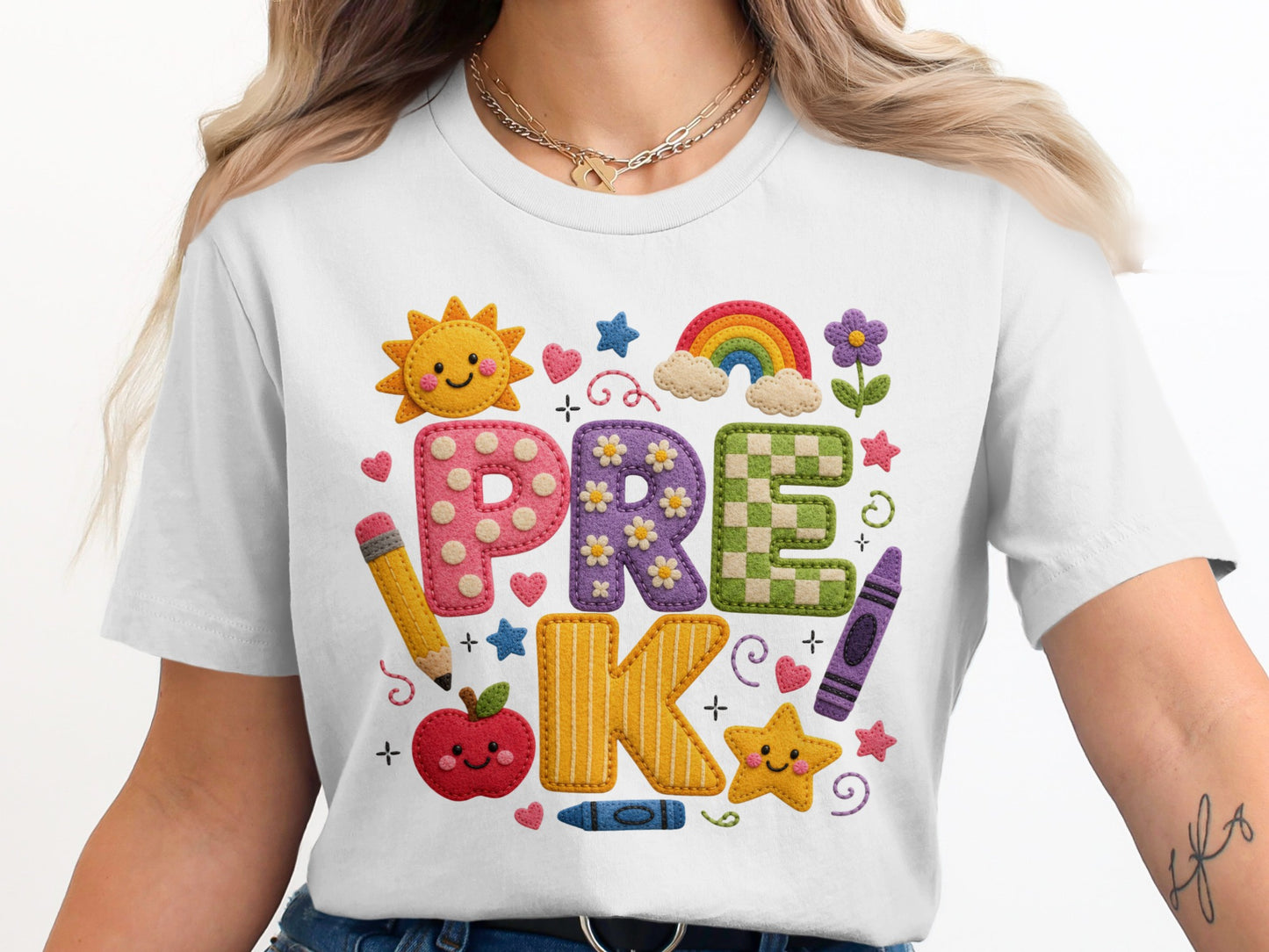White t-shirt with colorful "PRE K" text and school-themed graphics.