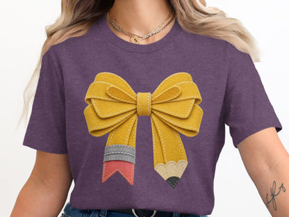 Purple t-shirt with a yellow pencil-shaped bow design