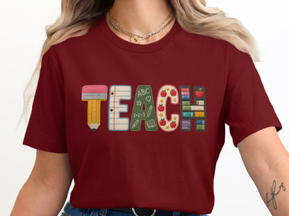 Maroon t-shirt with "TEACH" spelled out with school-themed letter designs.