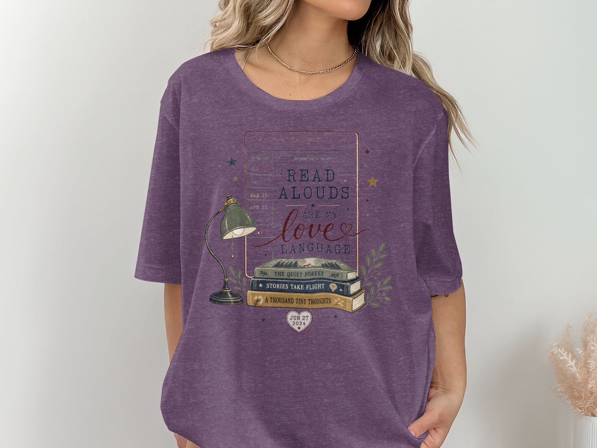 Purple t-shirt graphic: "Read Alouds Are My Love Language" with books, lamp, and heart.