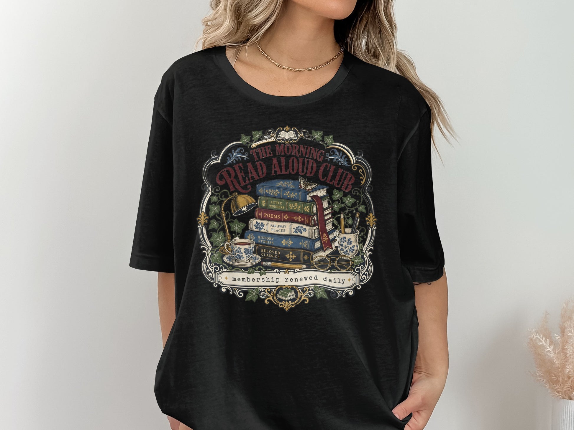 Black t-shirt with "The Morning Read Aloud Club" text and vintage book illustration.