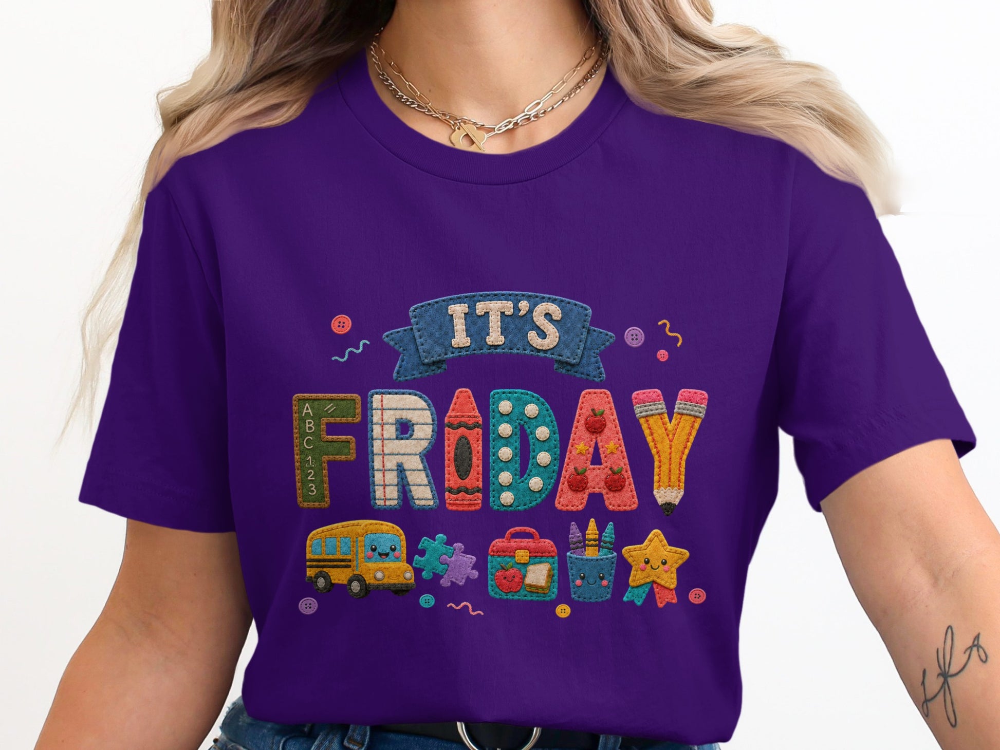 Purple t-shirt with "It's Friday" graphic and school-themed icons.