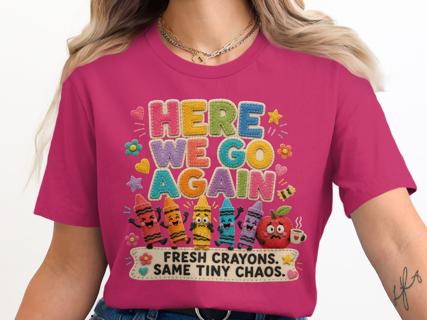 T-shirt with "Here We Go Again Fresh Crayons. Same Tiny Chaos." and cartoon crayons.