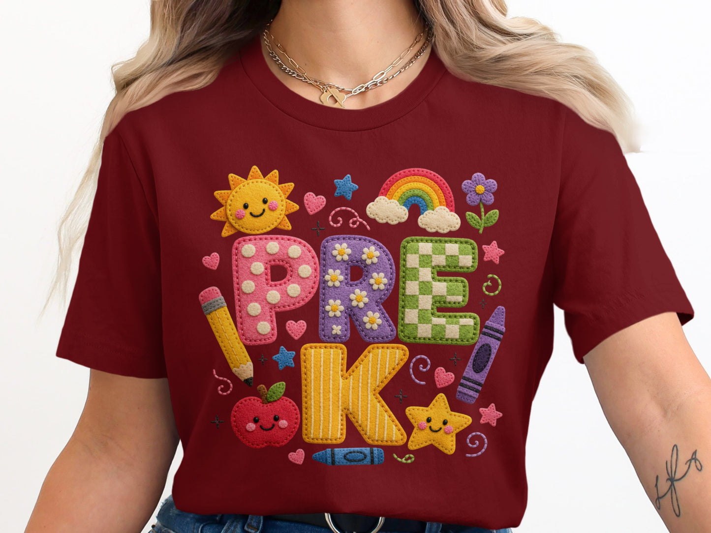 Maroon t-shirt with "PRE K" in colorful quilted letters and school-themed graphics.