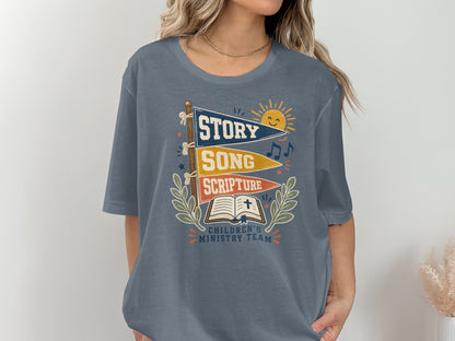 Children's Ministry Team shirt with Story, Song, Scripture flags and open bible.