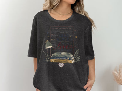 Dark gray t-shirt with "Read Alouds Are My Language" graphic and stacked books.