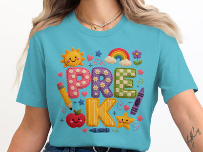 "PRE K" text with school-themed icons on a blue t-shirt.