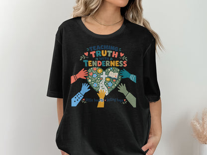 Black t-shirt with colorful graphic featuring a heart, open book, and text.