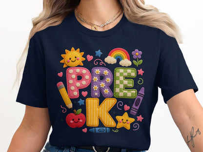 Navy t-shirt with colorful felt "PRE K" letters and school supply graphics.