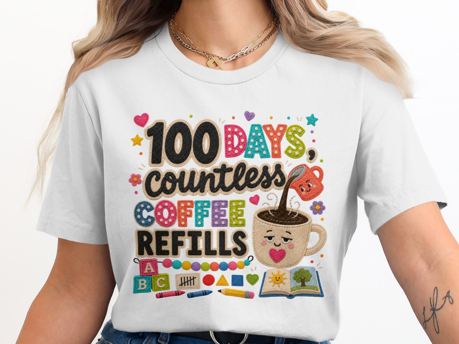 White t-shirt with "100 DAYS countless COFFEE REFILLS" graphic and children's school items.