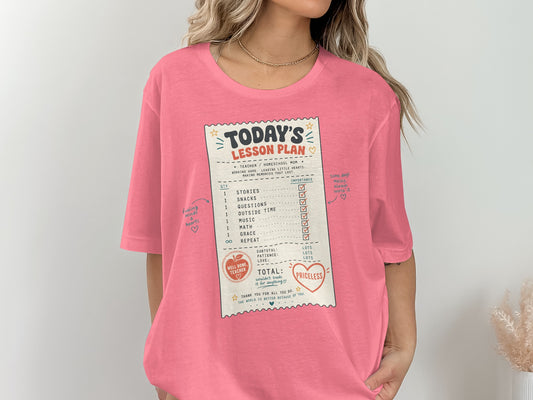 Pink t-shirt with "Today's Lesson Plan" graphic listing homeschool activities and their priceless value.
